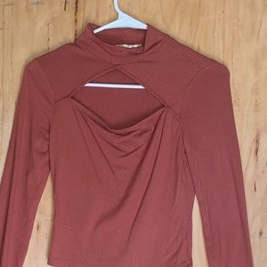 pinkish long sleeve shirt